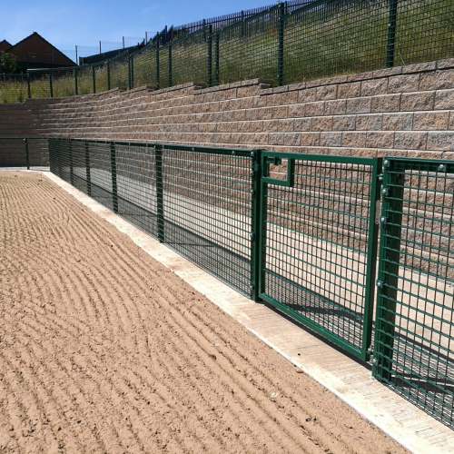 A view of the secure access gate connected to the spectator railing at the Michael Daviitts GAC pitch.